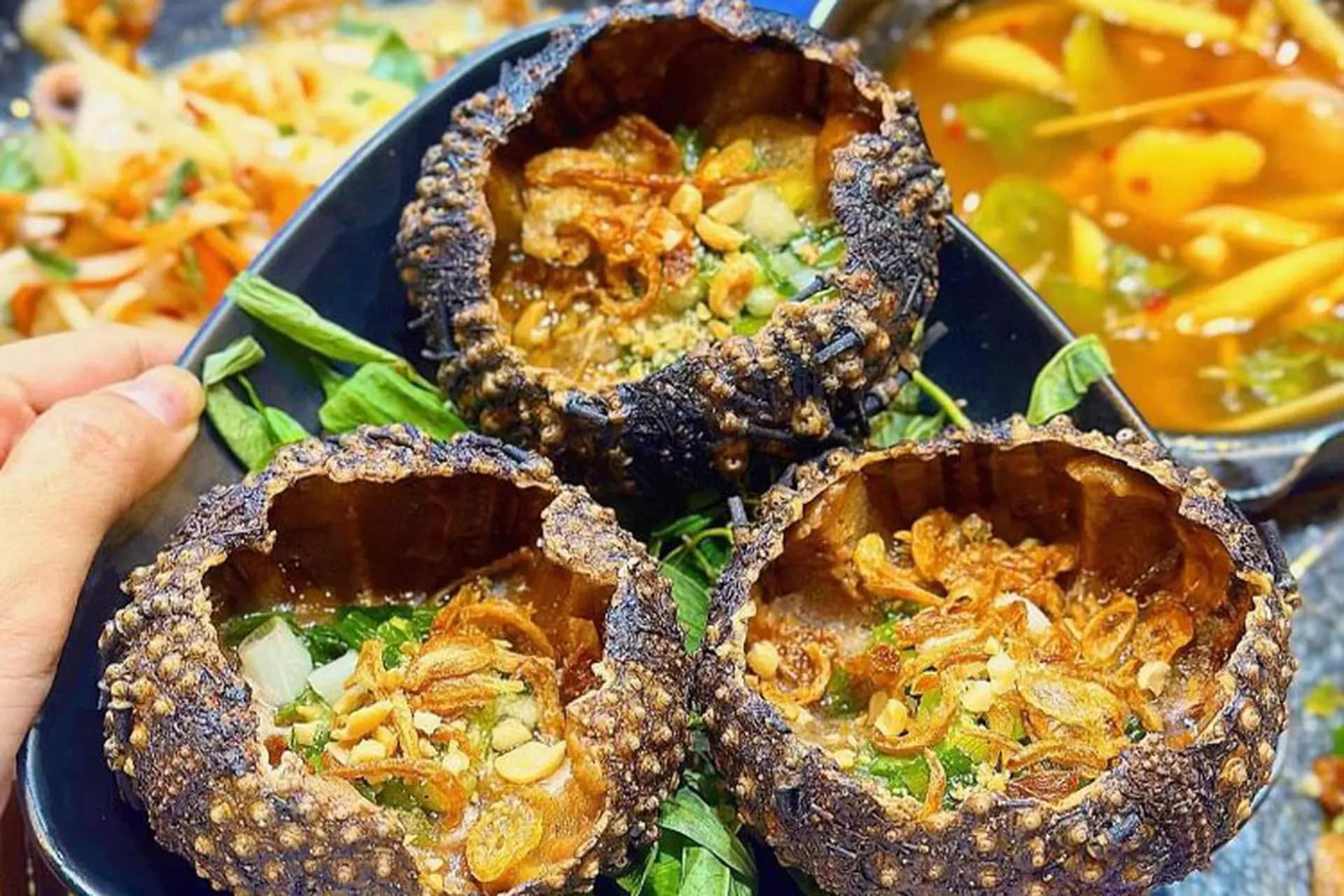 Grilled sea urchins with scallion oil
